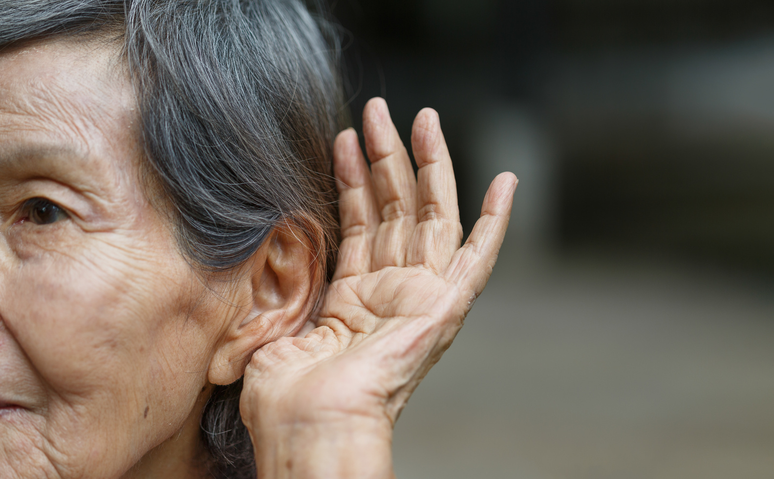 Elderly woman hearing loss , Hard of hearing